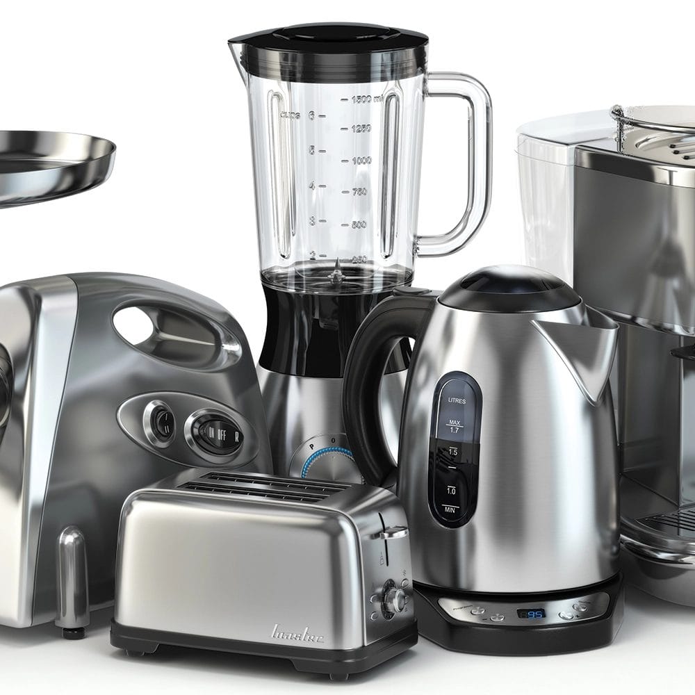a collection of electrical kitchen appliances in black and silver on a white table